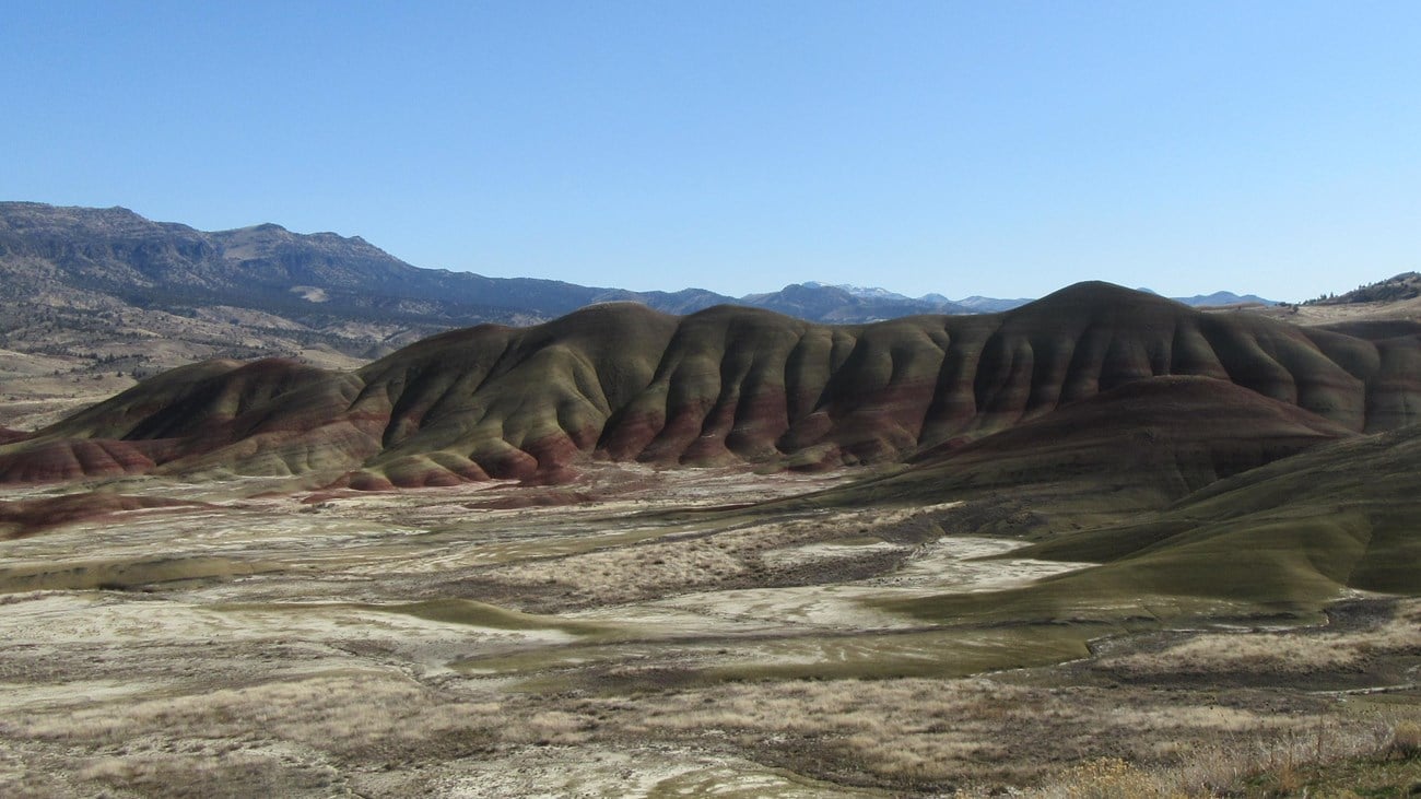 Red and green striped hills viewed from the Painted Hills Overlook Trail