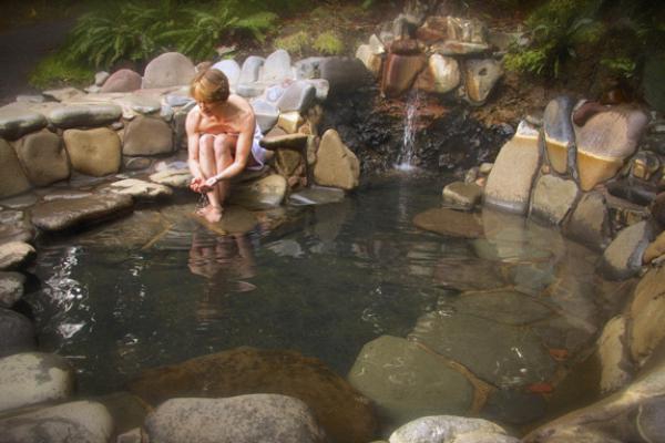 a woman soaking at breitenbush hot springs oregon