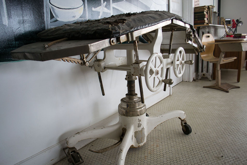 An original examination table used in the hotel hospital