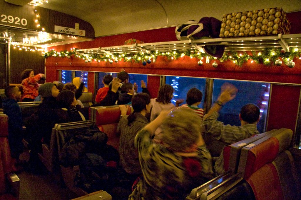 Inside a lighted Christmas train.