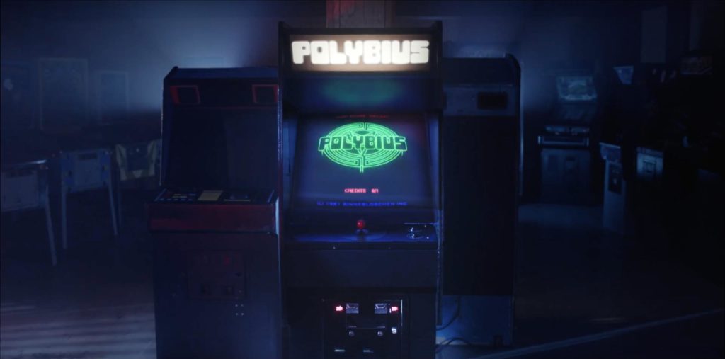 Recreated Polybius arcade cabinet glowing in a dark arcade