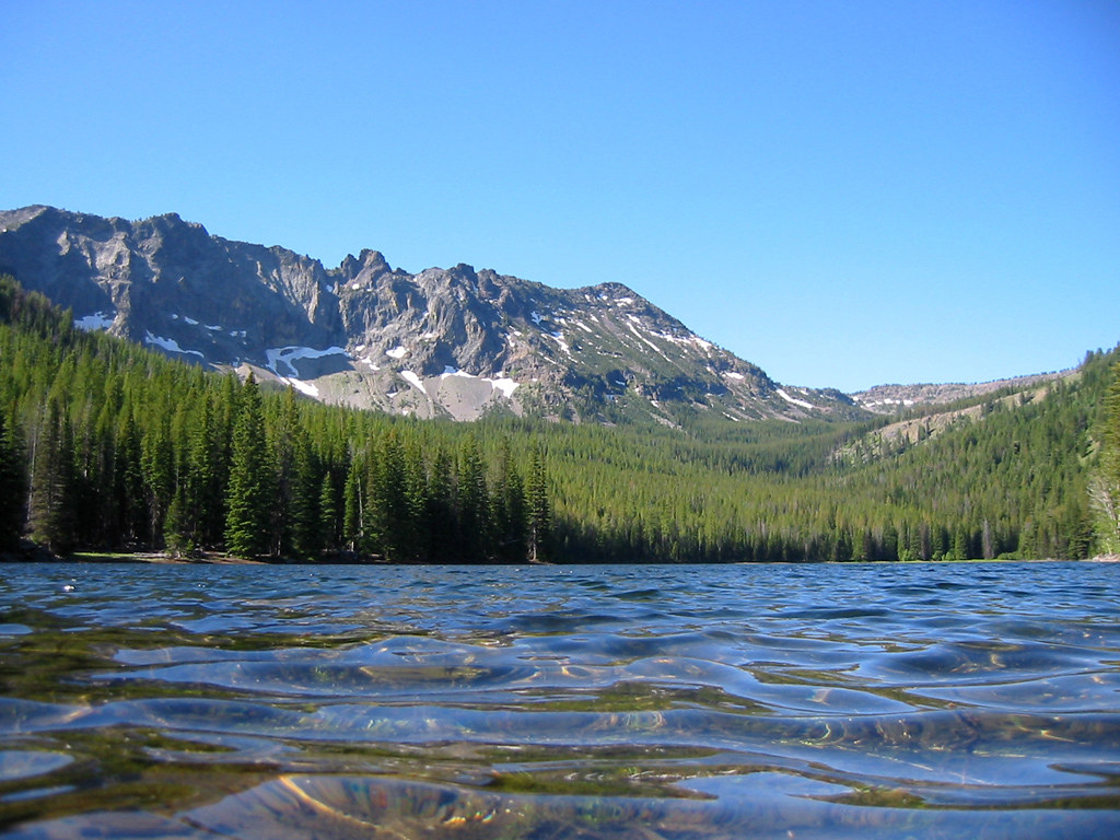 A beautiful remote mountain lake with a mountain behind it in Oregon