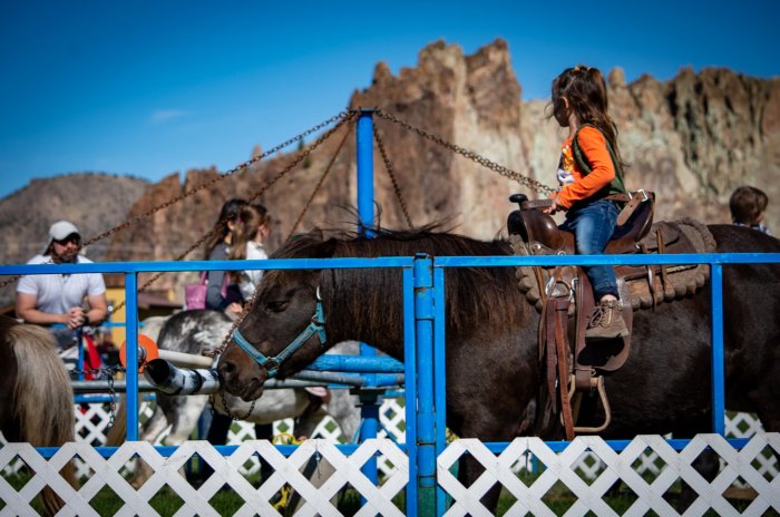 Kids ride ponies at Smith Rock Ranch in Oregon