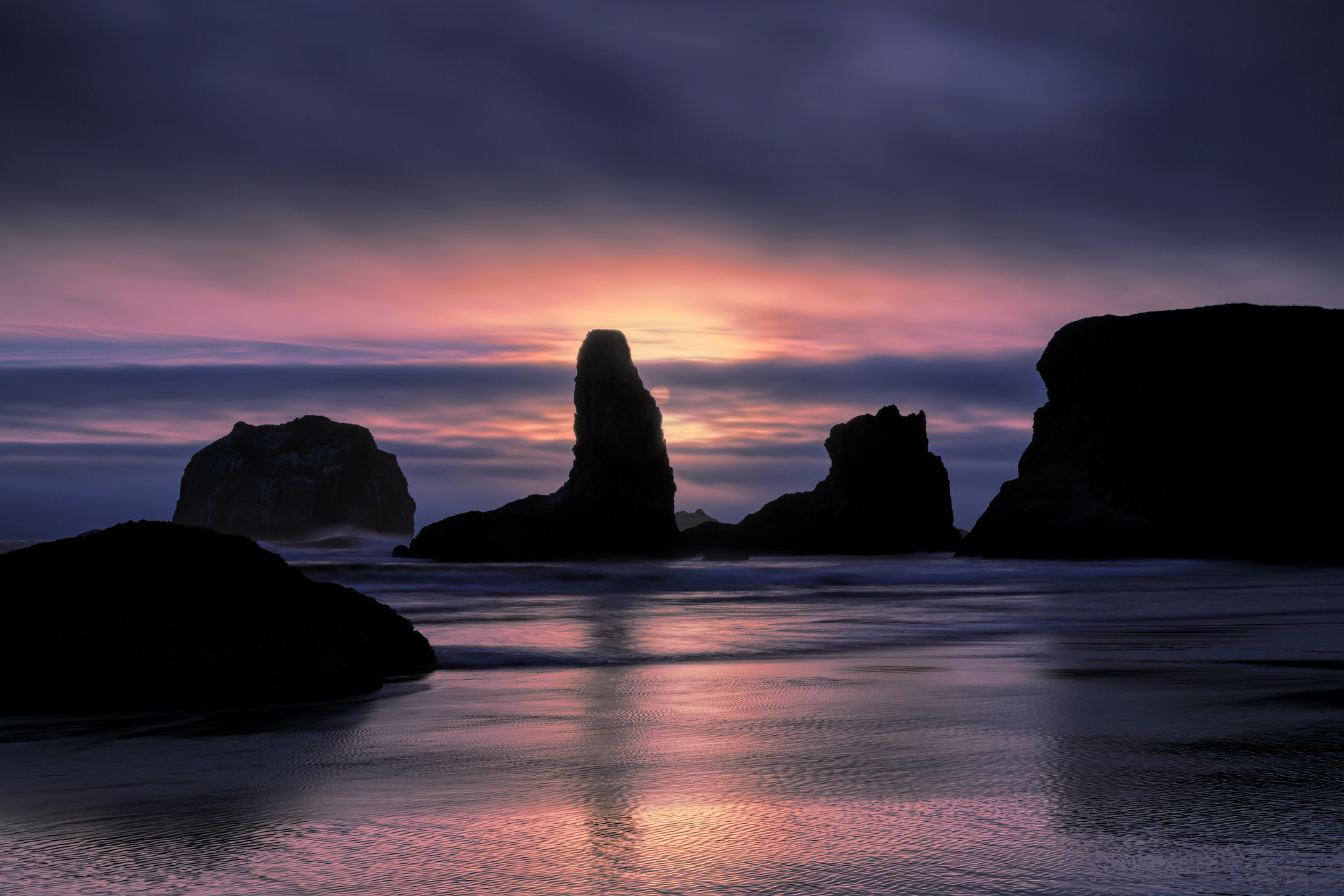 Blue and pink sunset over Bandon Sea stacks