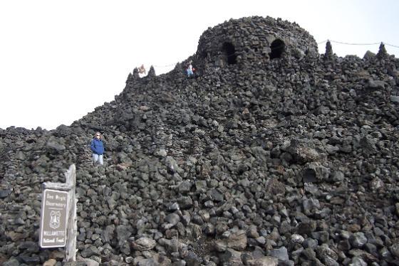 A circular castle like observatory made of stone in the Oregon Cascade Mountains.