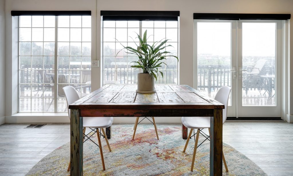 Gorgeous wood dining table at SCP Depoe Bay