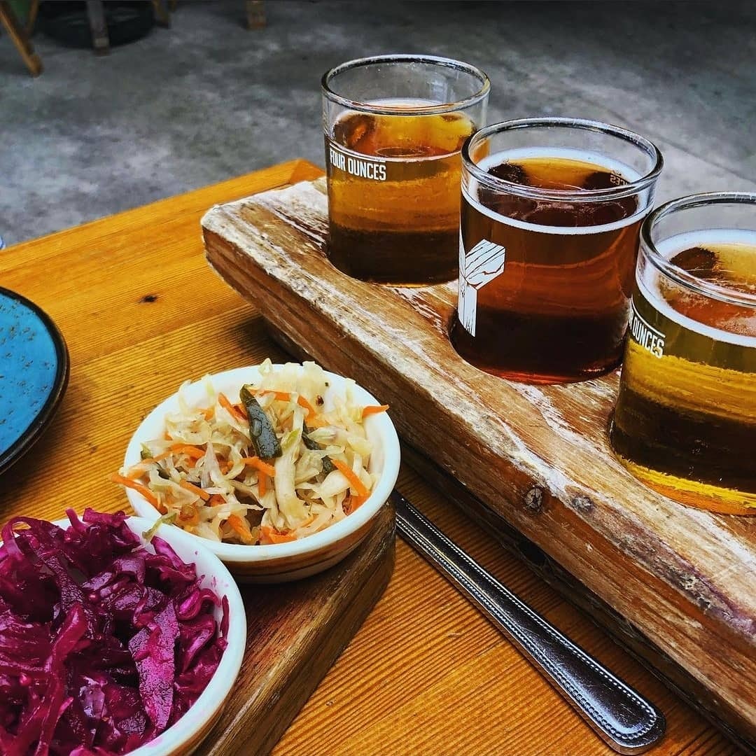 a beer flight with sauerkraut