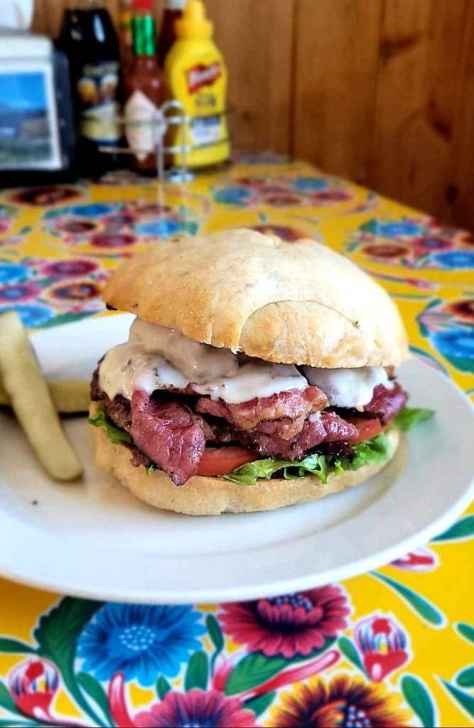 A delicious burger with bacon at Crazy Norwegian's Fish And Chips.