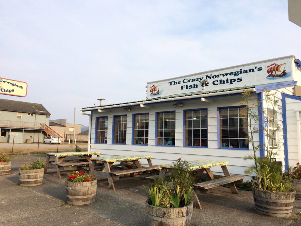 The Crazy Norwegian's Fish And Chips building. White with blue trim.