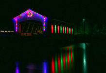 Lowell Covered Bridge In Oregon lit up with Christmas Lights.