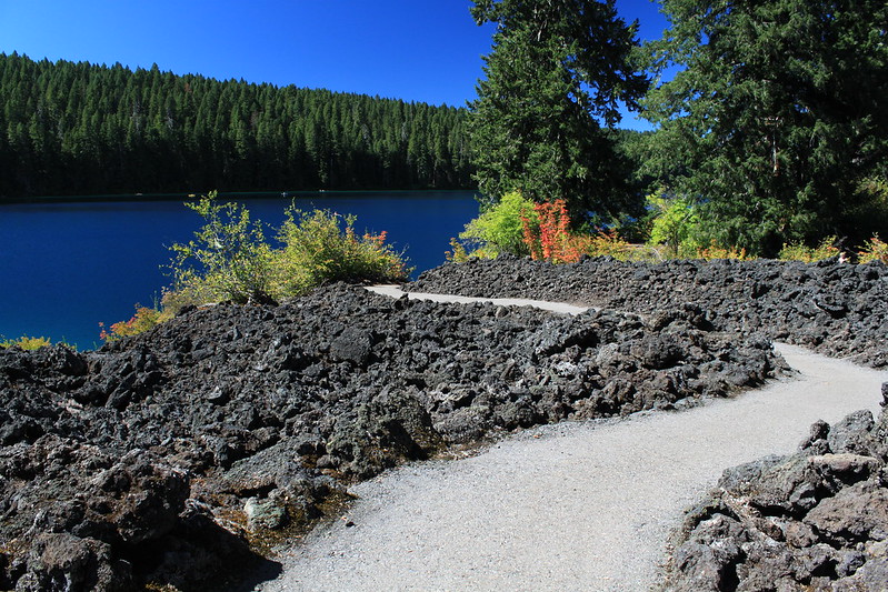 A trail through a lava flow at Clear Lake Oregon on a sunny day.