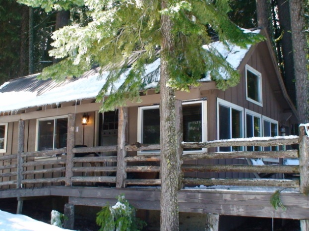 Cabin covered in snow at Odell Lake Resort.