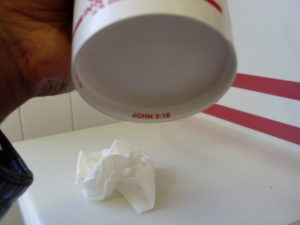 John 3:16 in red lettering, printed on the bottom of In-N-Out Burger soda cup