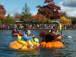 People paddling gigantic pumpkins in Tualatin Oregon
