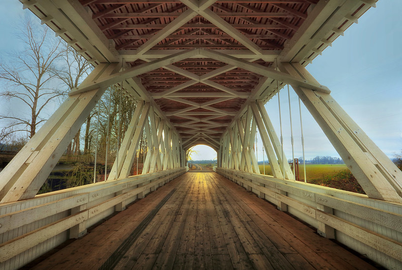 The inside of Gilkey Covered Bridge in the daytime.