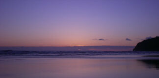 Sun setting on in the beach in Manzanita Oregon