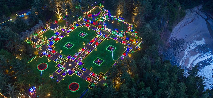 An aerial shot of Shore Acres lit up with many light displays.