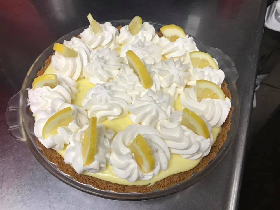 A yellow lemon pie with lemons at The Barlow Trail Roadhouse on Mount Hood in Oregon.