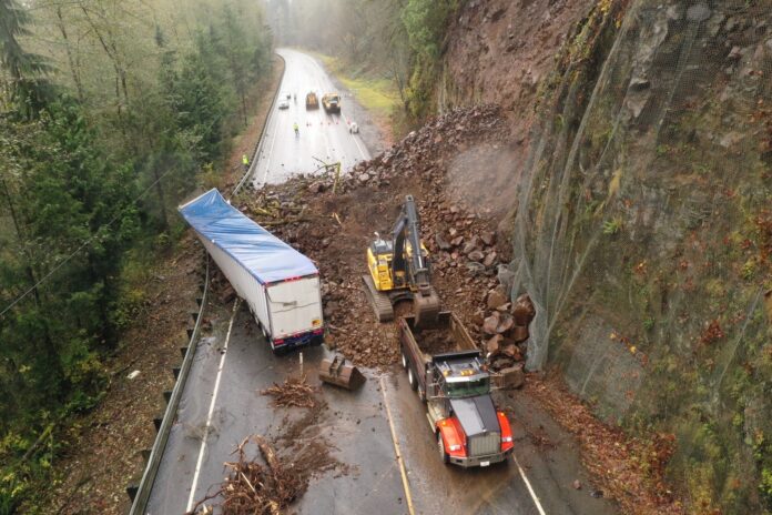 A landslide being removed by ODOT crews.