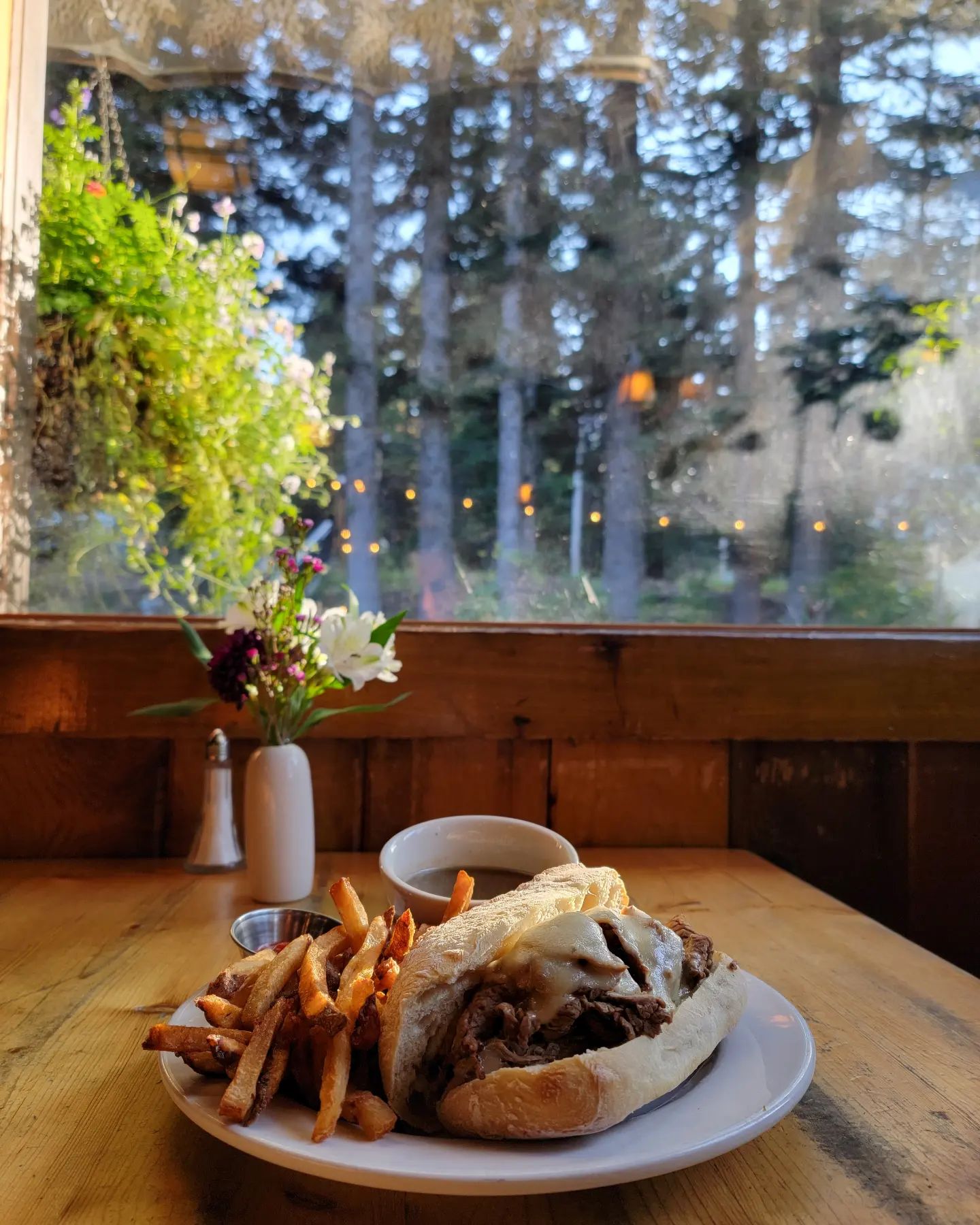 A delicious looking sandwich and fries from the restaurant at Cooper Spur in a cozy restaurant setting
