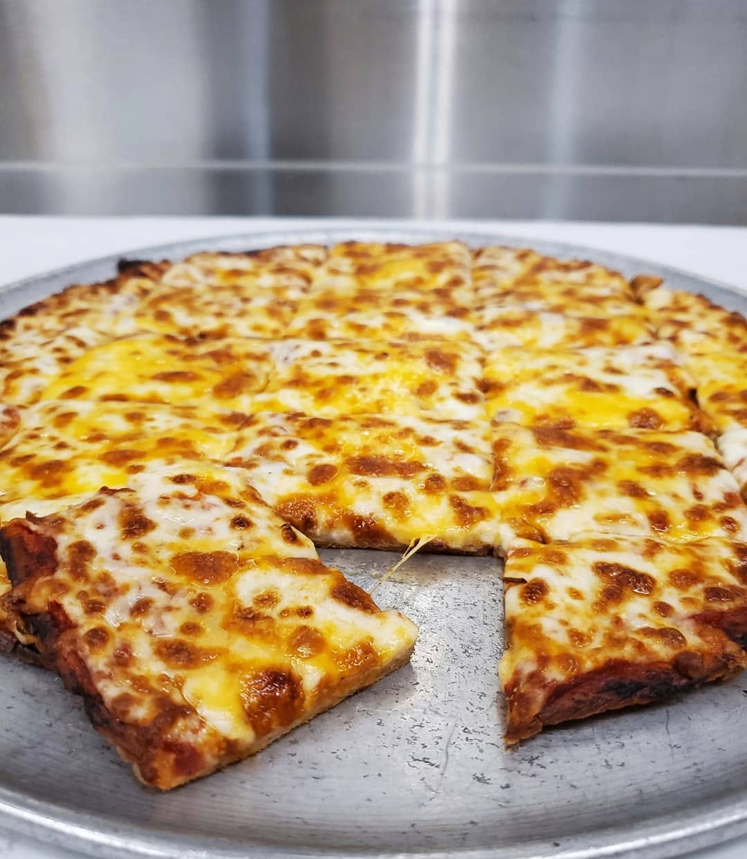 A cheese pizza from Wild River Brookings