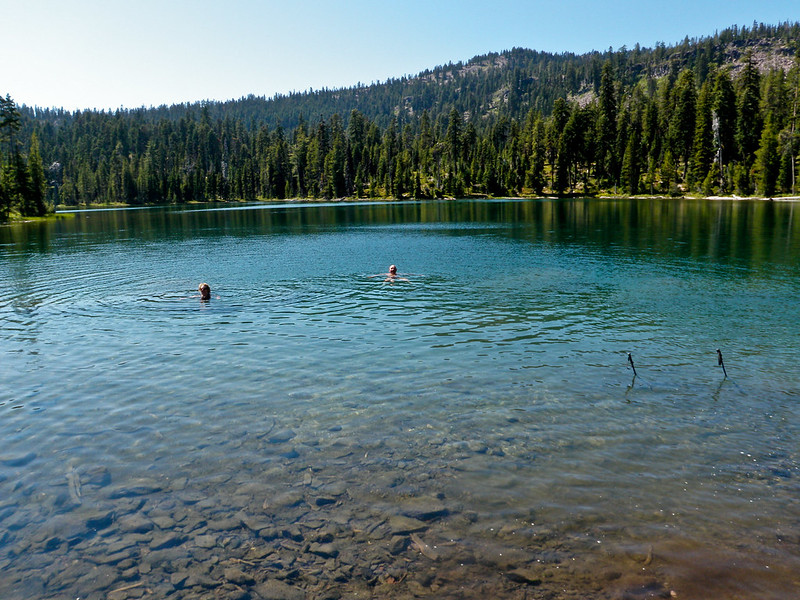 Swimmers in remote Trapper Lake in the Sky Lakes Wilderness Area.