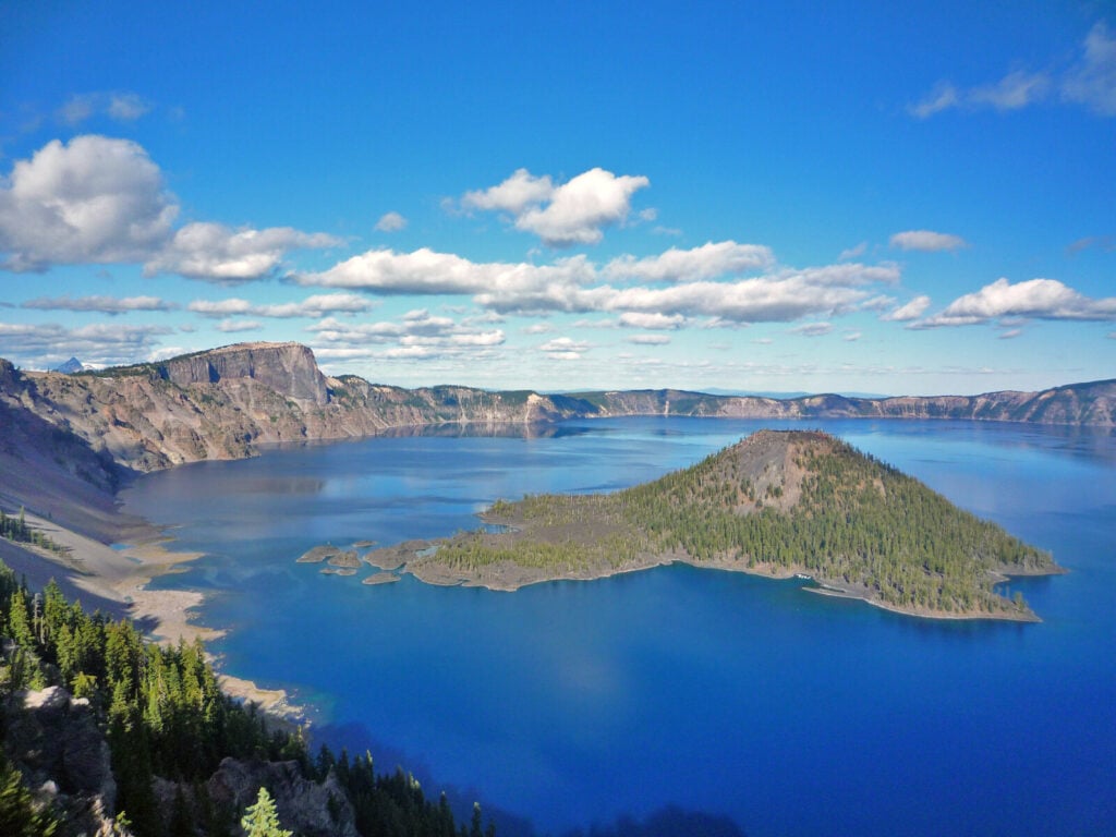 Wizard Island surrounded by the blue water of Crater Lake