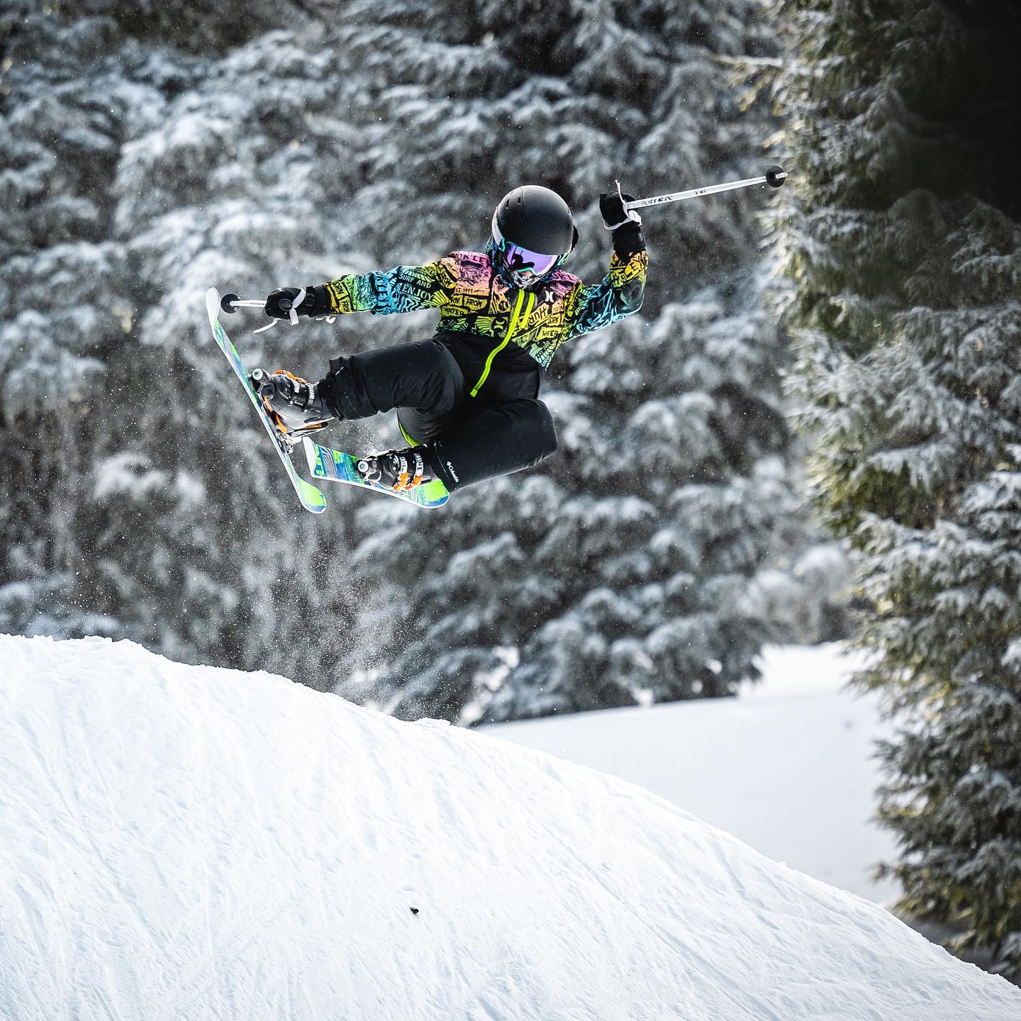 A person doing a jump at Mount Bachelor.