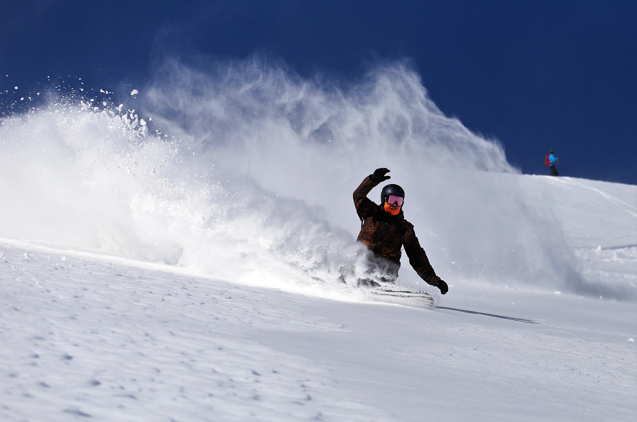 A person snowboarding at Mount Hood Meadows.