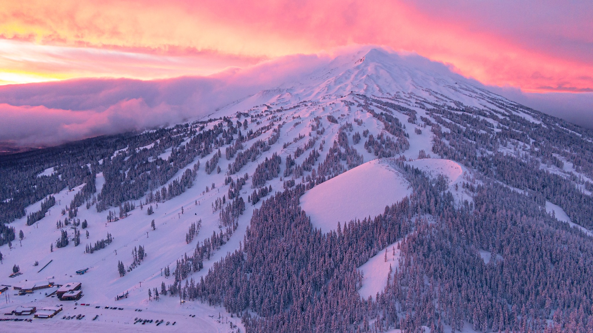 A pink sunset over Mount Bachelor.