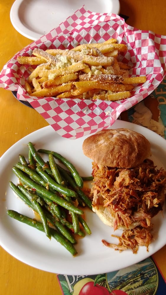 Pulled pork sandwich, green beans and garlic parmesan fries.