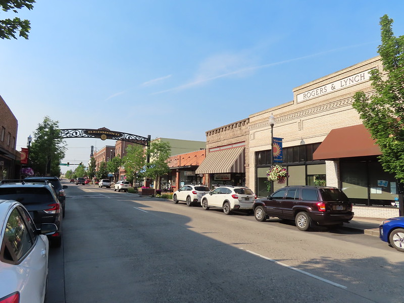 Downtown Redmond Oregon on a clear day with blue skies.