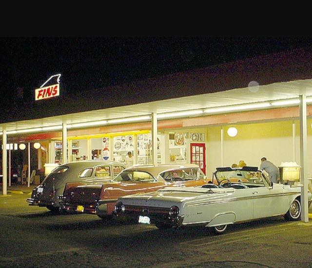An old photo of Fins Drive In at night from many years ago.