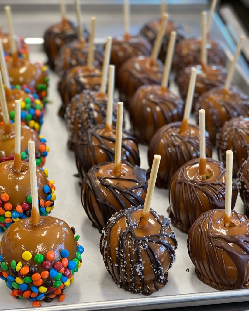 Candy apples dipped in candy like M and M's