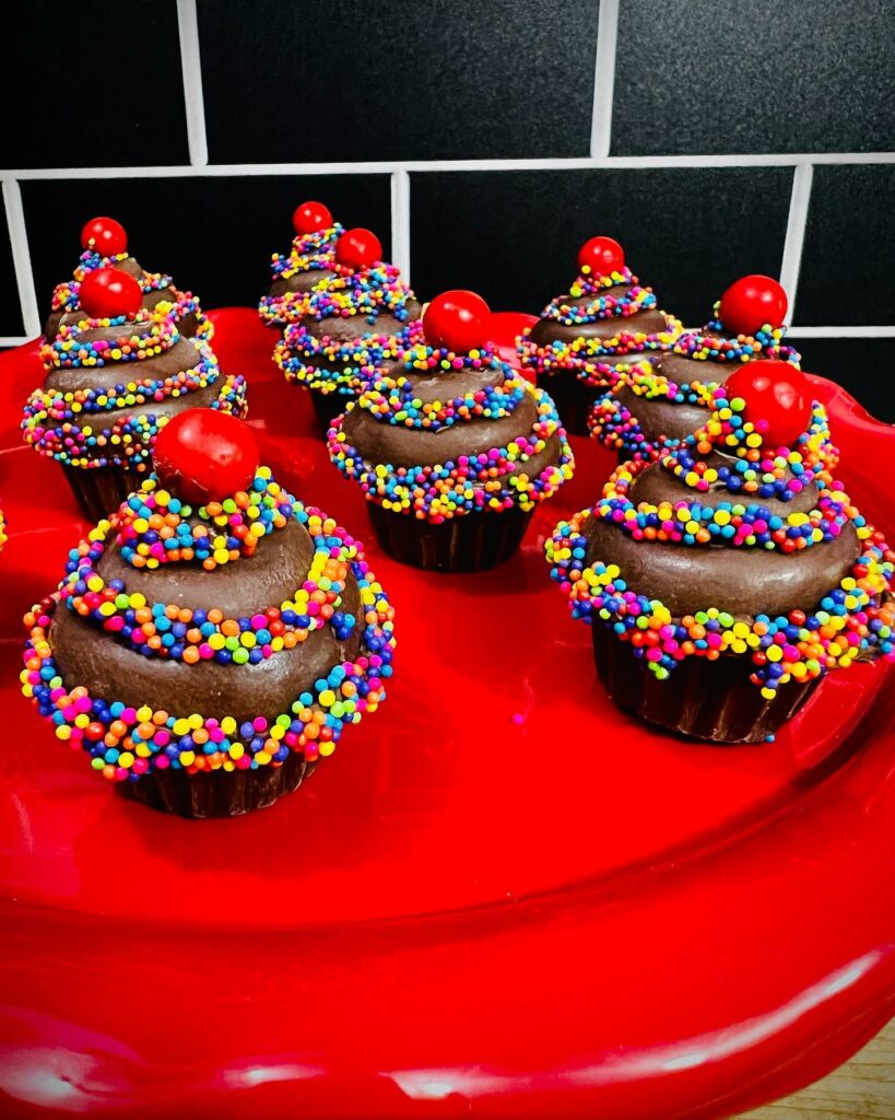 Cupcakes with chocolate frosting and colorful sprinkles