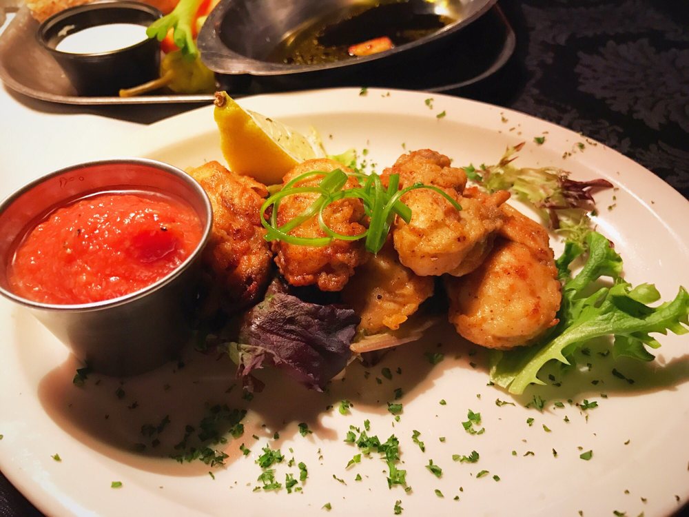 Fried oysters and a red sauce. Looks tasty!