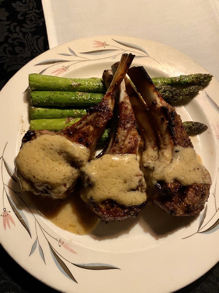 Rack of lamb over asparagus drizzled in sauce at Cimmityotti's in Pendleton. It looks delicious.