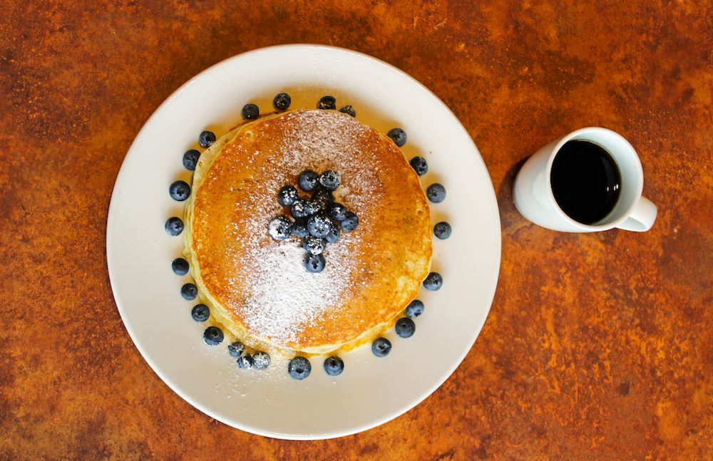 Blueberry pancakes and coffee.