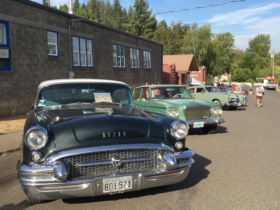 Classic cars lined up in Brownsville for Stand By Me Day.