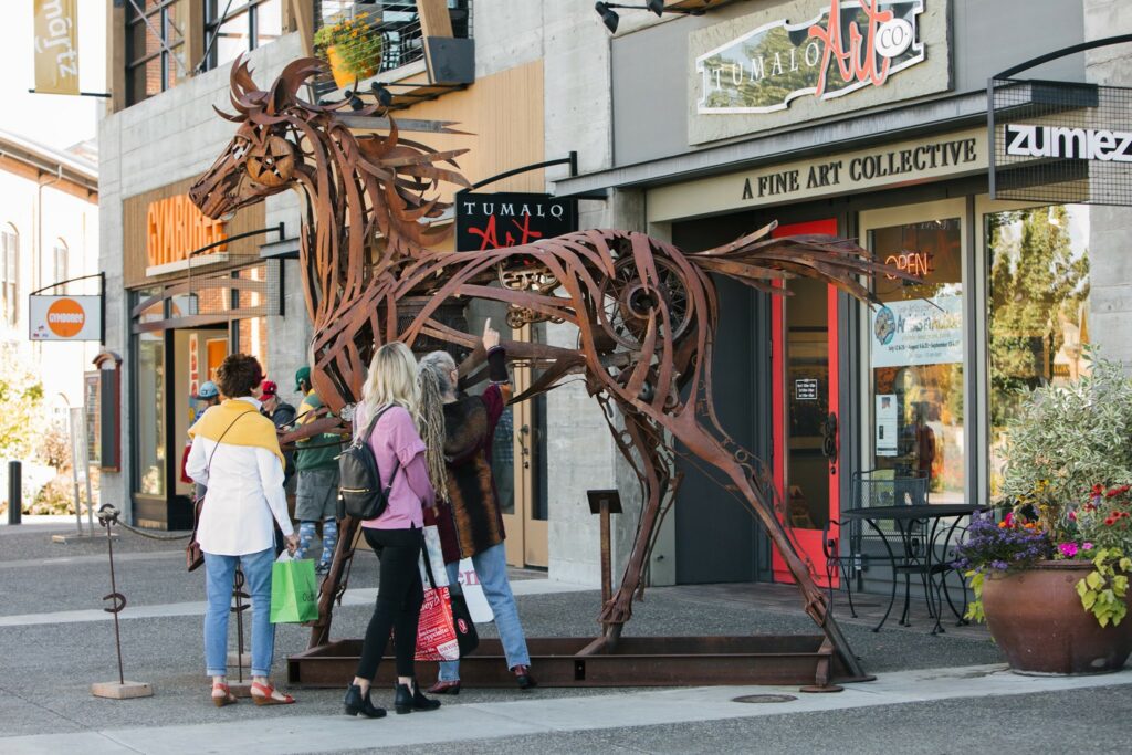 A large metal art piece of a horse.