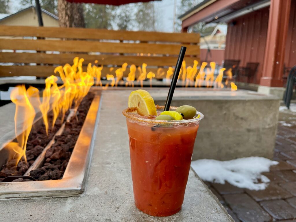 A bloody Mary by the outdoor fire pit.