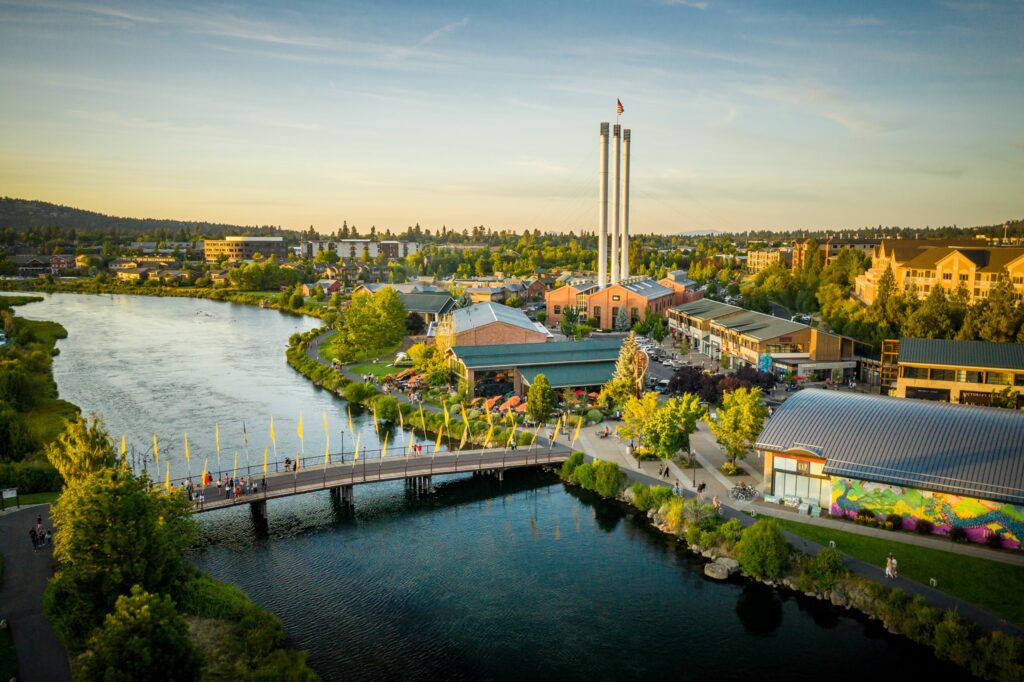 An aerial view of the Old Mill District, bend, best oregon towns, spring road trip, best towns to visit, 2024