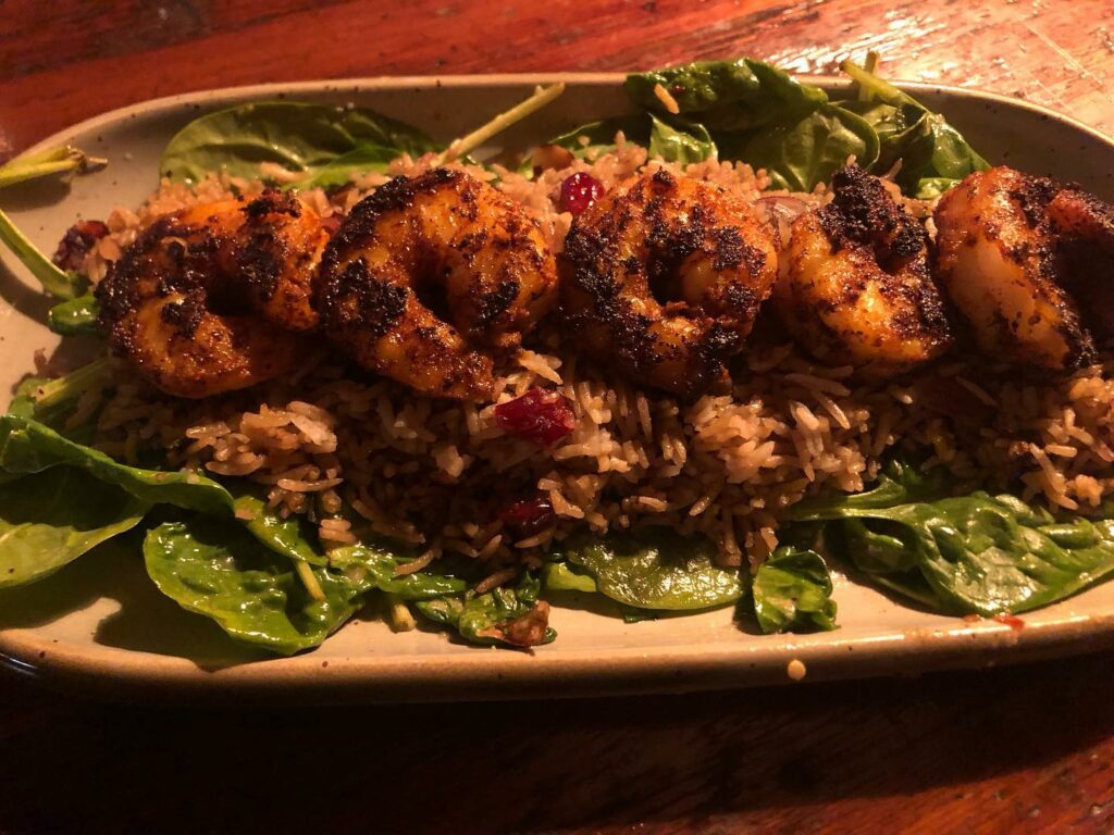 A delicious looking plate of food with fried shrimp.