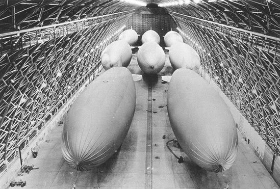 Eight blimps (k ships) in Air Hangar B at NAS Tillamook. It's an old black and white photo. tillamook air museum, planes, WWII, history, family things to do, oregon coast