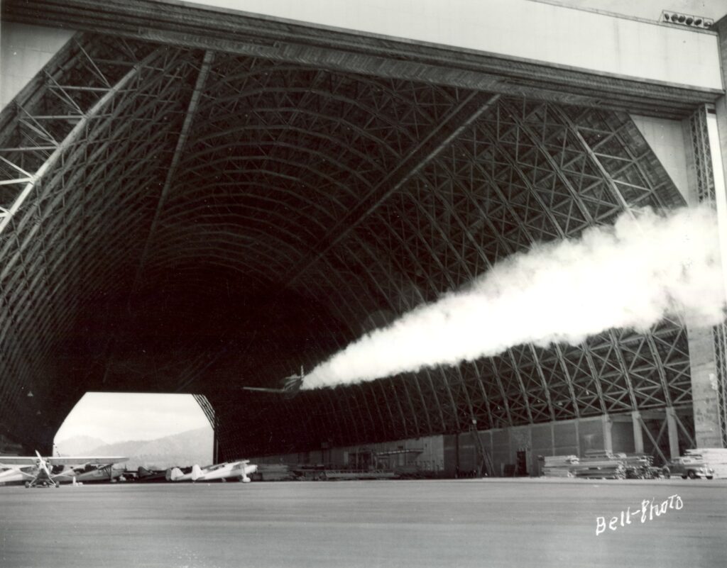 Swede Ralston flying through the Tillamook Air Museum's Hangar B in 1950. tillamook air museum, planes, WWII, history, family things to do, oregon coast