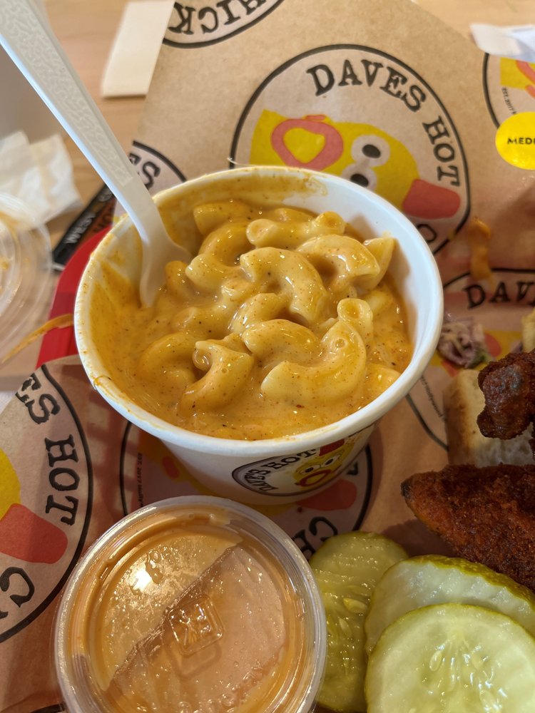 A creamy plastic cup of macaroni and cheese at Dave's Hot Chicken.