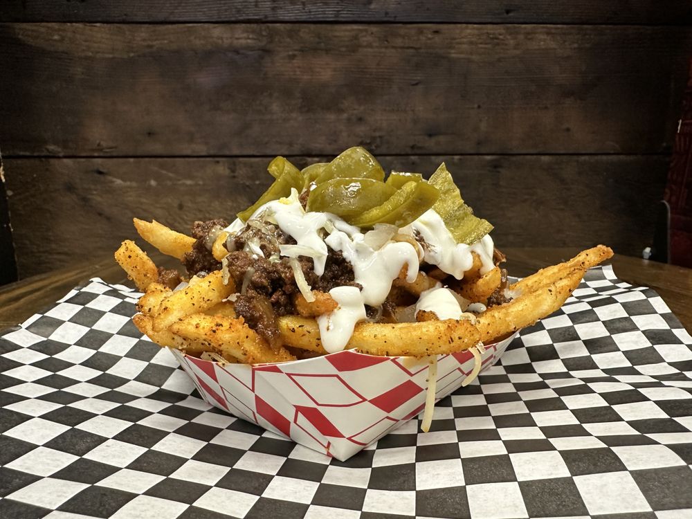 Chili fries. They looks o good and are piled high with toppings.