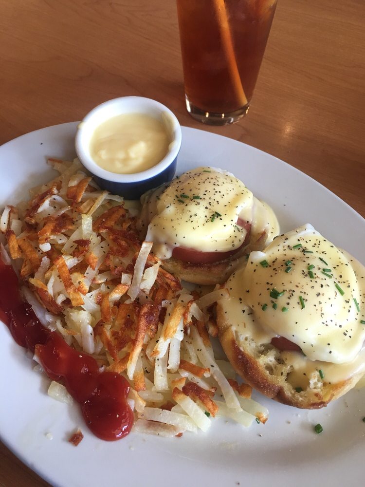 Hash browns Eggs Benedict with Hollandaise Sauce.