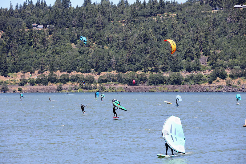 Windsurfers on the Columbia River in Hood River, Oregon, best oregon towns, spring road trip, best towns to visit, 2024