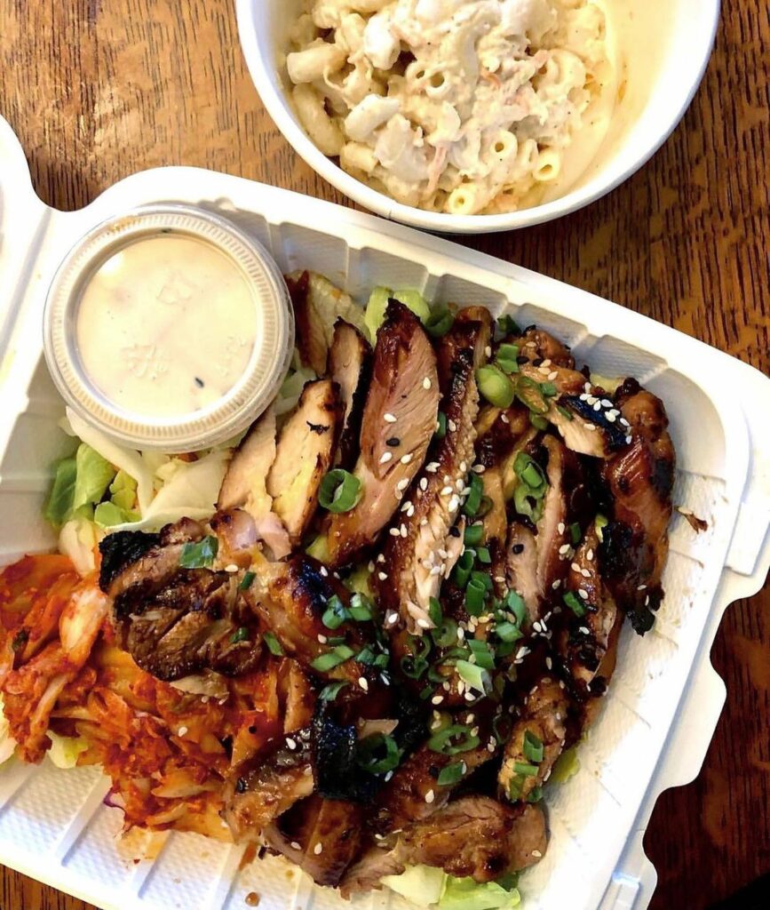 A container of delicious looking grilled meat and veggies with a side of sauce and a bowl of mac salad from from Ate-Oh-Ate.
portland oregon, best restaurants, 2024, where to eat, best brunch, food and drink, bars, pizza, sushi, thai food, PDX, foodie heaven